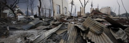 A burnt house is seen in Meikhtila