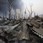 A burnt house is seen in Meikhtila