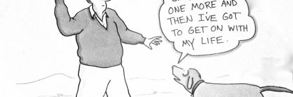 A man holding a stick while speaking to a dog that is looking up at him.